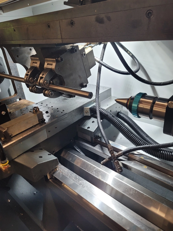 Machining equipment drilling into a barrel